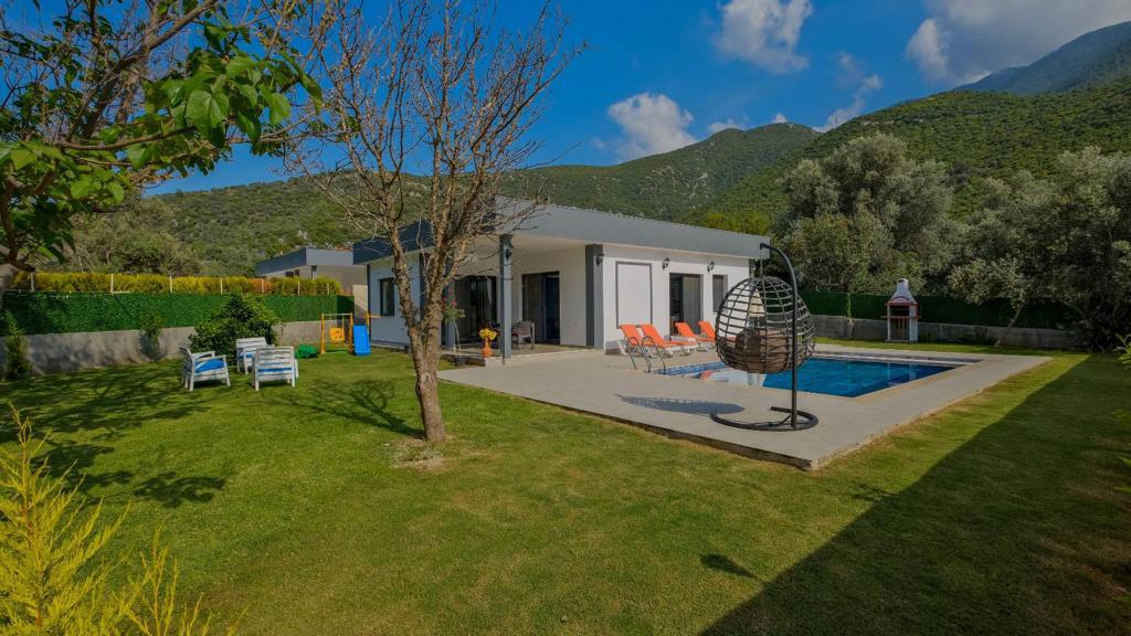 Fethiye Taşyakada 2+1 Özel Havuzlu Denize Yakın Kiralık Lüks Villa DRM-1701